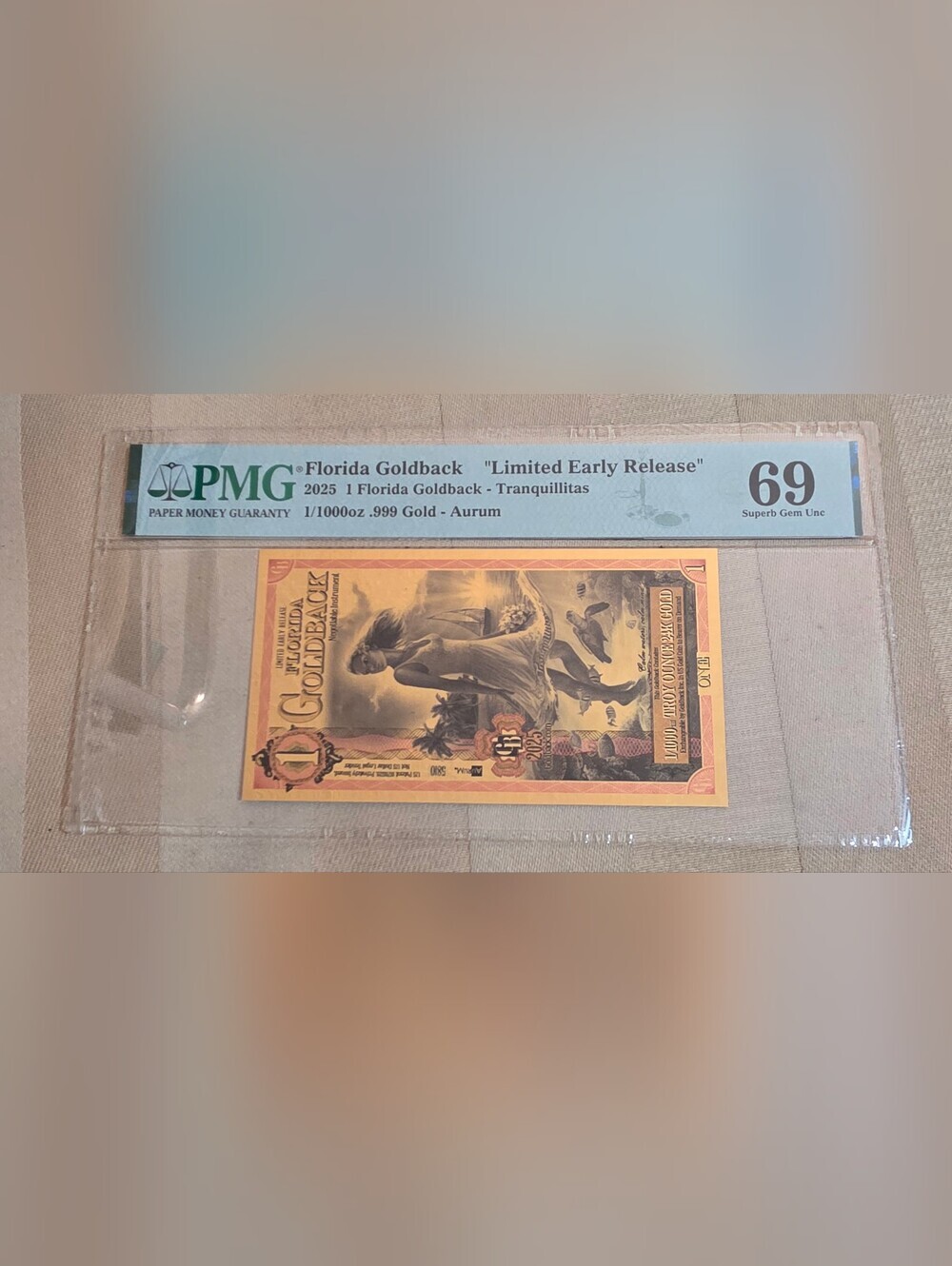PMG 69 FLORIDA (1) GOLDBACK LIMITED EARLY RELEASE, 2025 TRANQUILLITIES